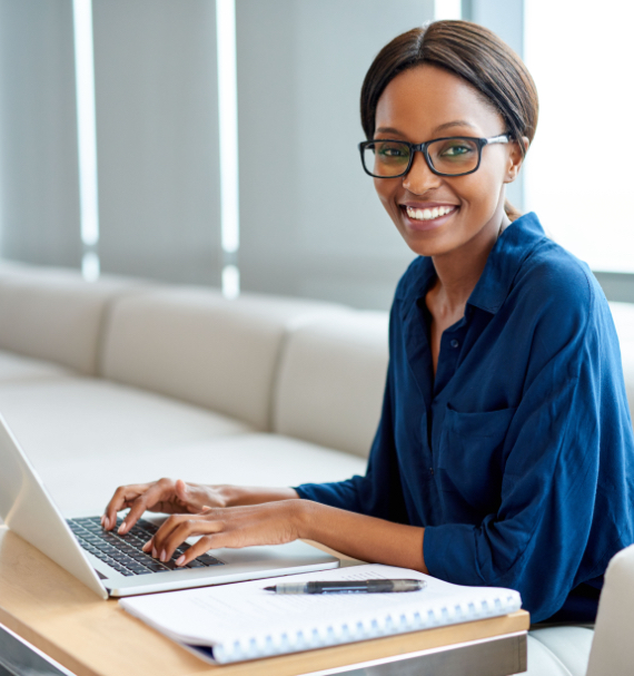 lady smiling at laptop